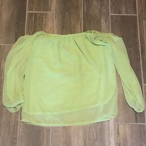 Light and bright green off the shoulder flow top.